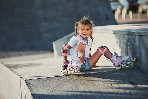 Cute Little Girl Roller Skates Outdoors Sits Ramp Extreme Sports — Stock Photo, Image