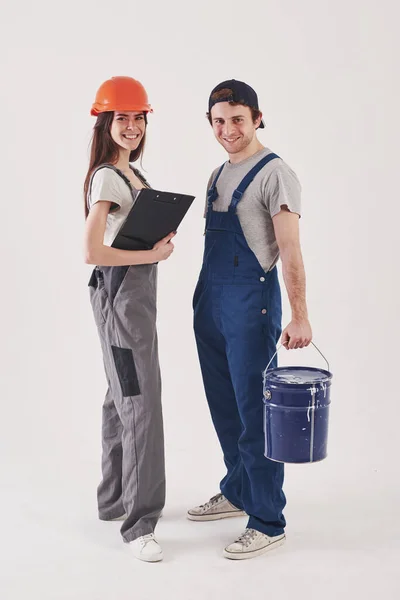 Trabajando Juntos Hombre Uniforme Azul Con Mujer Sombrero Duro Levanta —  Fotos de Stock