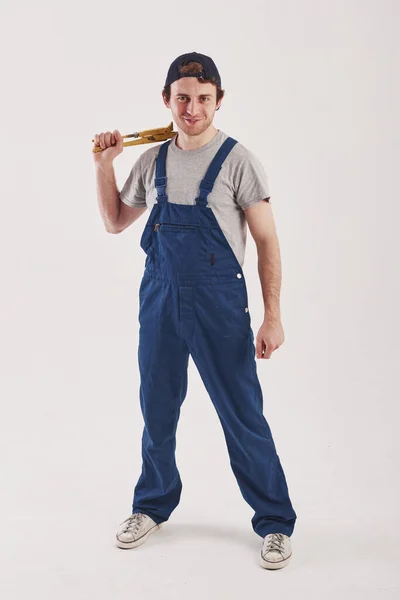 Přední Pohled Muž Modré Uniformě Stojí Bílém Pozadí Studiu — Stock fotografie
