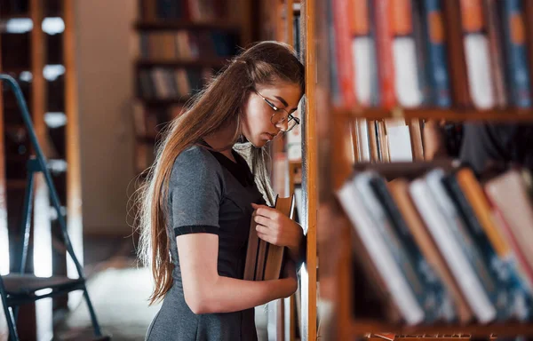 Leaning Shelves Feels Tired Female Student Library Full Books Conception — Stock Photo, Image
