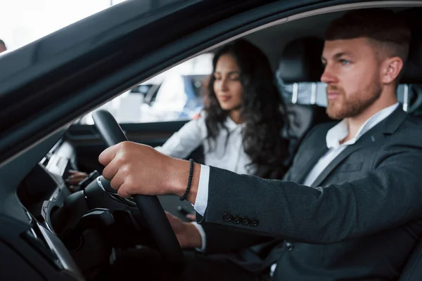 Concentrated Driving Lovely Successful Couple Trying New Car Automobile Salon — Stock Photo, Image