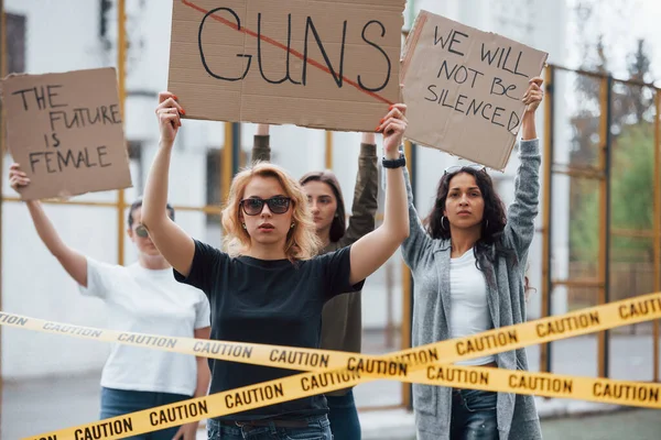 Proving their rights. Group of feminist women have protest outdoors.