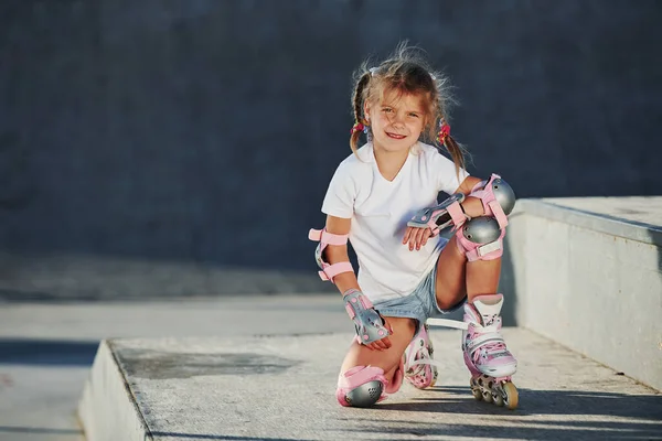 Cute Little Girl Roller Skates Outdoors Sits Ramp Extreme Sports — Stock Photo, Image