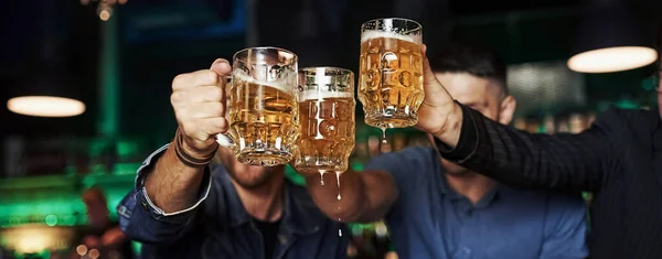 Knocking Glasses Three Sports Fans Bar Watching Soccer Beer Hands — Stock Photo, Image