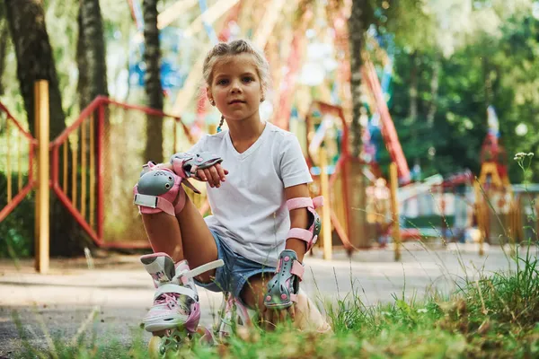 Sits Green Grass Cheerful Little Girl Roller Skates Have Good — Stock Photo, Image