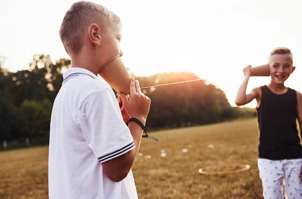 Two Boys Stands Field Talking Using String Can Phone — Stock Photo, Image