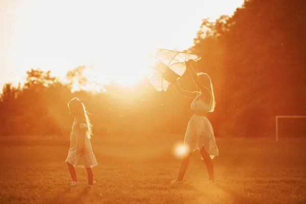 Illuminated Sunlight Mother Daughter Have Fun Kite Field Beautiful Nature — Stock Photo, Image