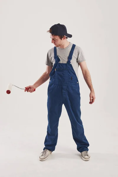 Chegou Novo Dia Trabalho Homem Uniforme Azul Fica Contra Fundo — Fotografia de Stock