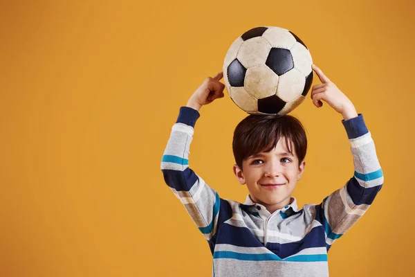 Portrait Young Soccer Player Ball Stands Yellow Background — Stock Photo, Image
