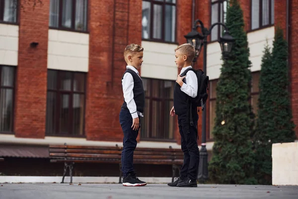 Two Little Boys School Uniform Outdoors Together Education Building — 图库照片