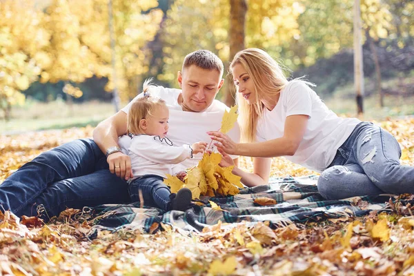Cheerful Young Family Lying Ground Have Rest Autumn Park Together — Stock Photo, Image
