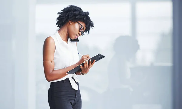 Young African American Woman Glasses Stands Indoors Have Business Call — Stock Photo, Image