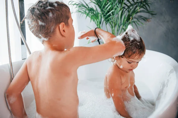 Two Kids Having Fun Washing Themselves Bath Home — Stock fotografie