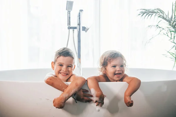 Two Kids Having Fun Washing Themselves Bath Home Posing Camera — Stock fotografie