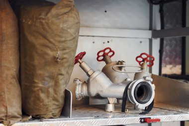Close up view of firefighter's equipment that is inside of the truck.