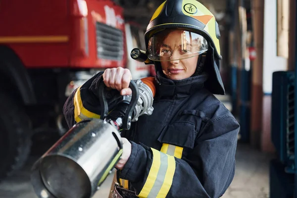 Hose Hands Female Firefighter Protective Uniform Standing Truck — Zdjęcie stockowe