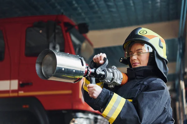 Hose Hands Female Firefighter Protective Uniform Standing Truck — Fotografia de Stock