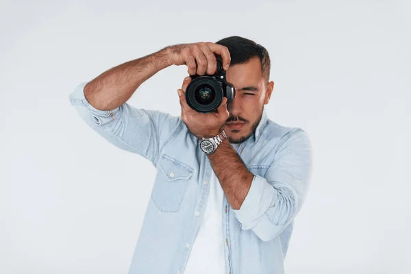 Professional Camera Young Handsome Man Standing Indoors White Background — Stockfoto