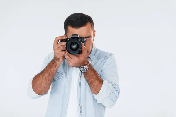 Professional Camera Young Handsome Man Standing Indoors White Background — Stockfoto