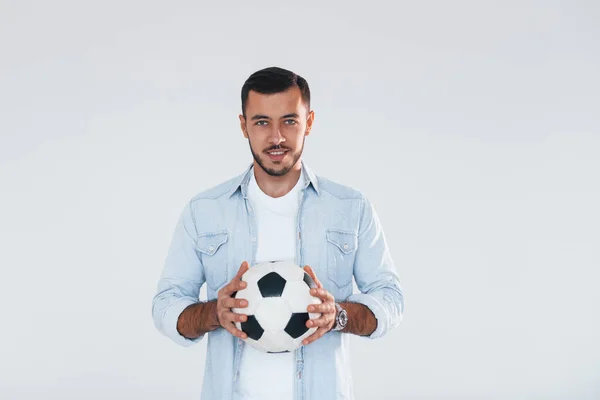 Football Fan Soccer Ball Young Handsome Man Standing Indoors White — Foto de Stock