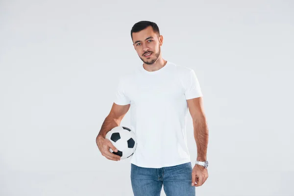 Football Fan Soccer Ball Young Handsome Man Standing Indoors White — Foto de Stock