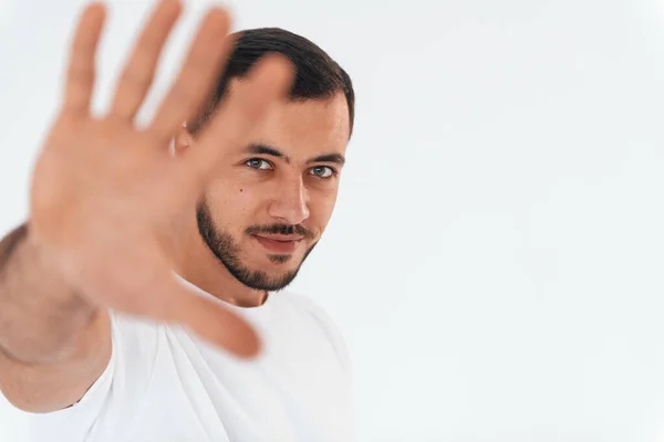 Stop Gesture Young Handsome Man Standing Indoors White Background — Stockfoto
