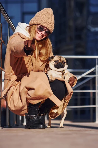 Woman Warm Clothes Sitting Have Fun Her Little Pug Dog — Foto Stock