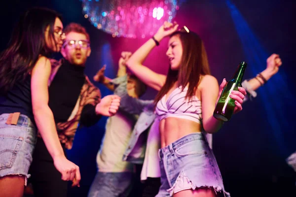 Girl Holding Bottle Young People Having Fun Night Club Colorful — Stock Photo, Image