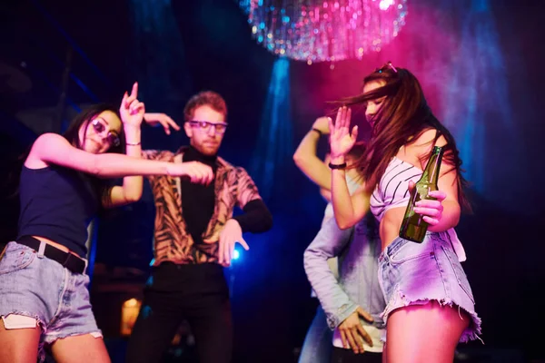 Girl Holding Bottle Young People Having Fun Night Club Colorful — Stock Photo, Image