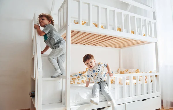Two Little Boys Resting Have Fun Indoors Bedroom Together — Stock Photo, Image