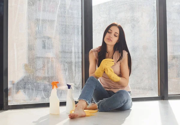 Woman Sits Window Sill Bottles Cleaning Spray Gloves — Zdjęcie stockowe