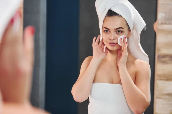 Beautiful Young Woman Standing Bathroom Looking Mirror Taking Care Her — Stock Fotó