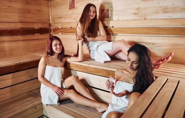 Group Young Female Friends Lying Have Rest Sauna Together Conception — Foto de Stock