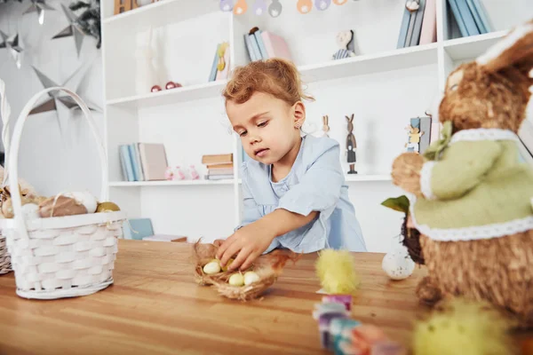 Cute Little Girl Celebrating Easter Holidays Indoors Table Eggs — Stockfoto