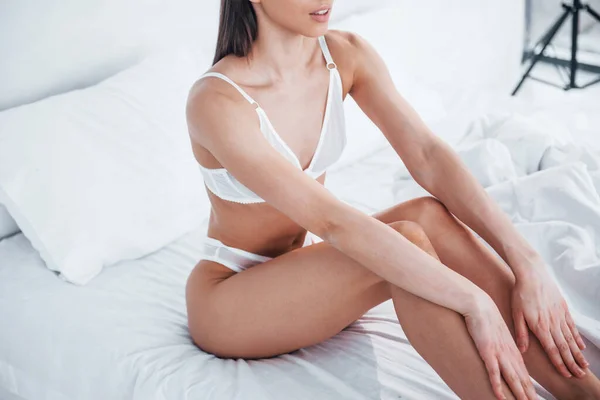 Slender Woman White Underwear Sitting Bed Indoors Room Daytime — Stok fotoğraf