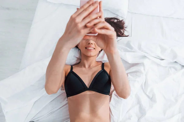 Slender Woman Black Underwear Lying Bed Indoors Room Daytime Making — Fotografia de Stock