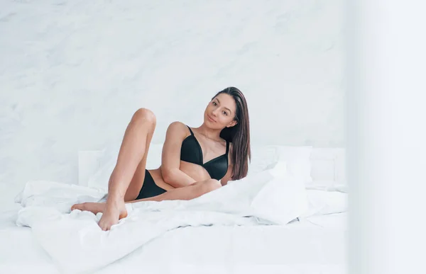 Slender Woman Black Underwear Lying Bed Room Daytime — Fotografia de Stock