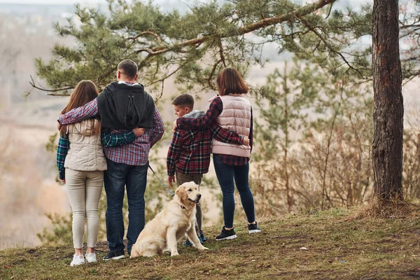 Rear View Family Standing Together Dog Outdoors Forest —  Fotos de Stock