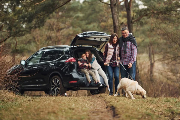 Happy Family Have Fun Dog Modern Car Outdoors Forest — Photo