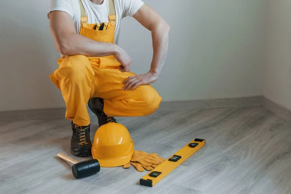 Tools Floor Handyman Yellow Uniform Standing Indoors House Renovation Conception — Stok fotoğraf