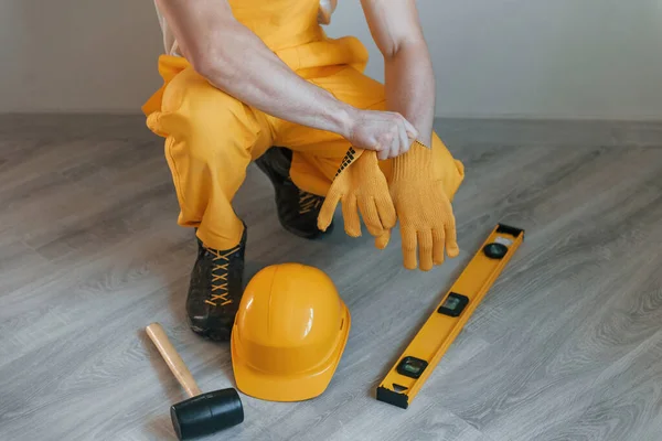 Tools Floor Handyman Yellow Uniform Standing Indoors House Renovation Conception — Stock Photo, Image