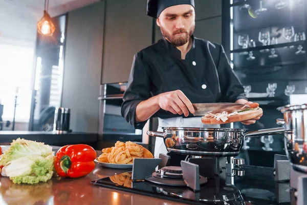 Professional Young Chef Cook Uniform Working Kitchen — Fotografia de Stock