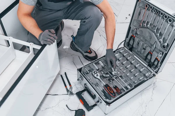 Young Professional Plumber Grey Uniform Using Equipment Kitchen Preparing Work — Zdjęcie stockowe