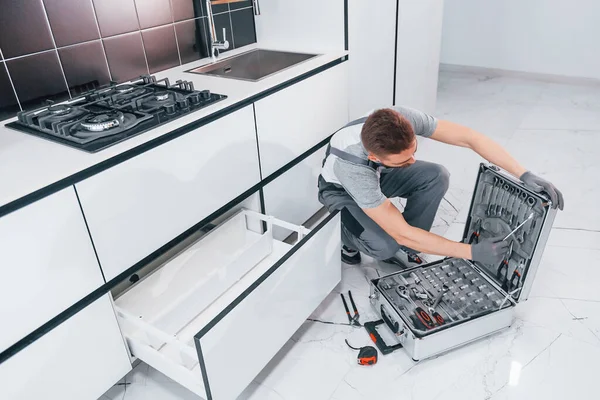 Young Professional Plumber Grey Uniform Using Equipment Kitchen Preparing Work — Zdjęcie stockowe