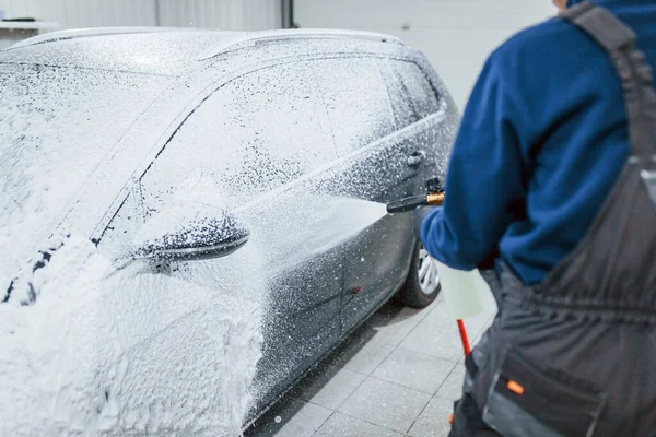 Male Worker Uniform Washing New Modern Car Covered Soap Conception — стоковое фото