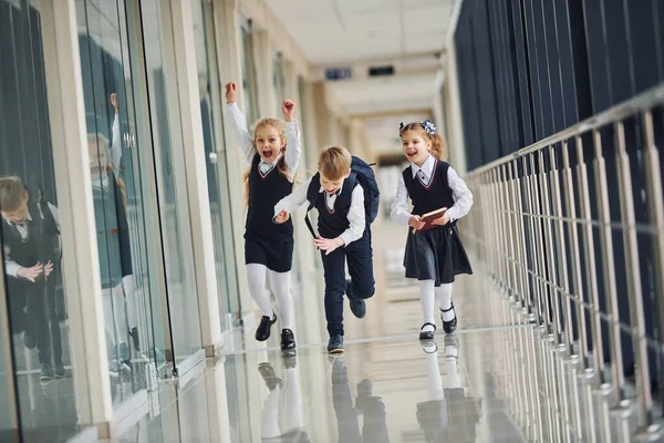 Active School Kids Uniform Running Together Corridor Conception Education — Zdjęcie stockowe