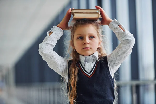 Young Little School Girl Uniform Standing Hallway Books — Stok fotoğraf