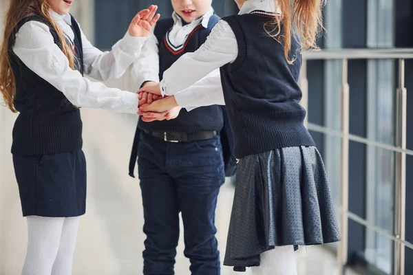 School Kids Uniform Making Victory Gesture Together Corridor Conception Education — Stok fotoğraf