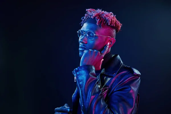 Listening Music Futuristic Neon Lighting Young African American Man Studio — Stock Fotó