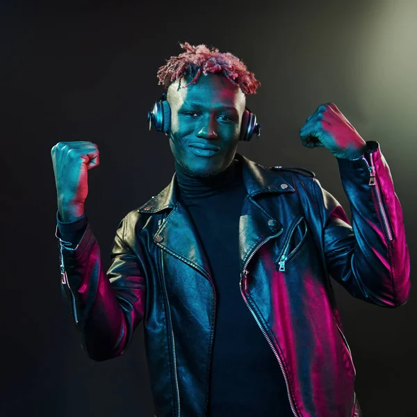 Dancing Headphones Futuristic Neon Lighting Young African American Man Studio — стокове фото